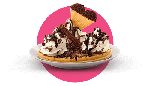 waffle with ice cream chocolate sauce and a flake with wafer biscuit