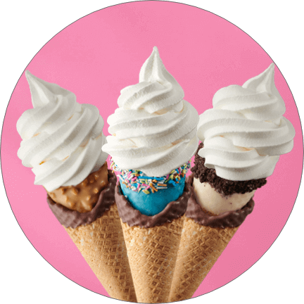 Three ice cream cones with swirls of ice cream